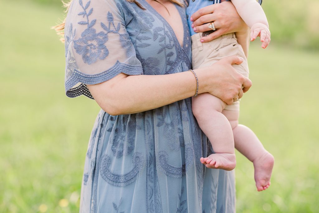 mom holds toddler during 6 Month Milestone Portraits