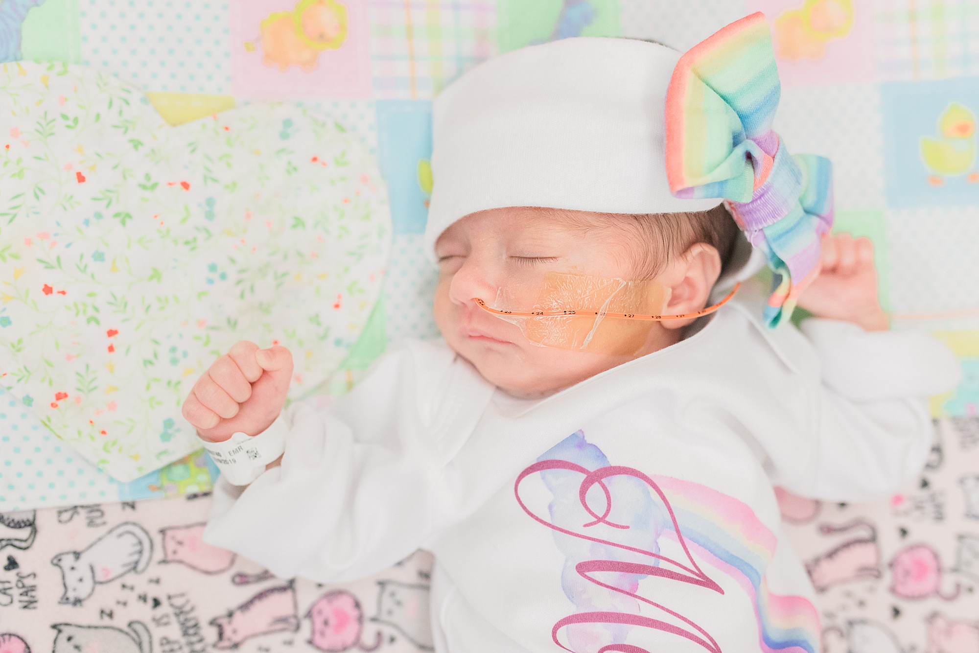 baby sleeps during NICU newborn portraits