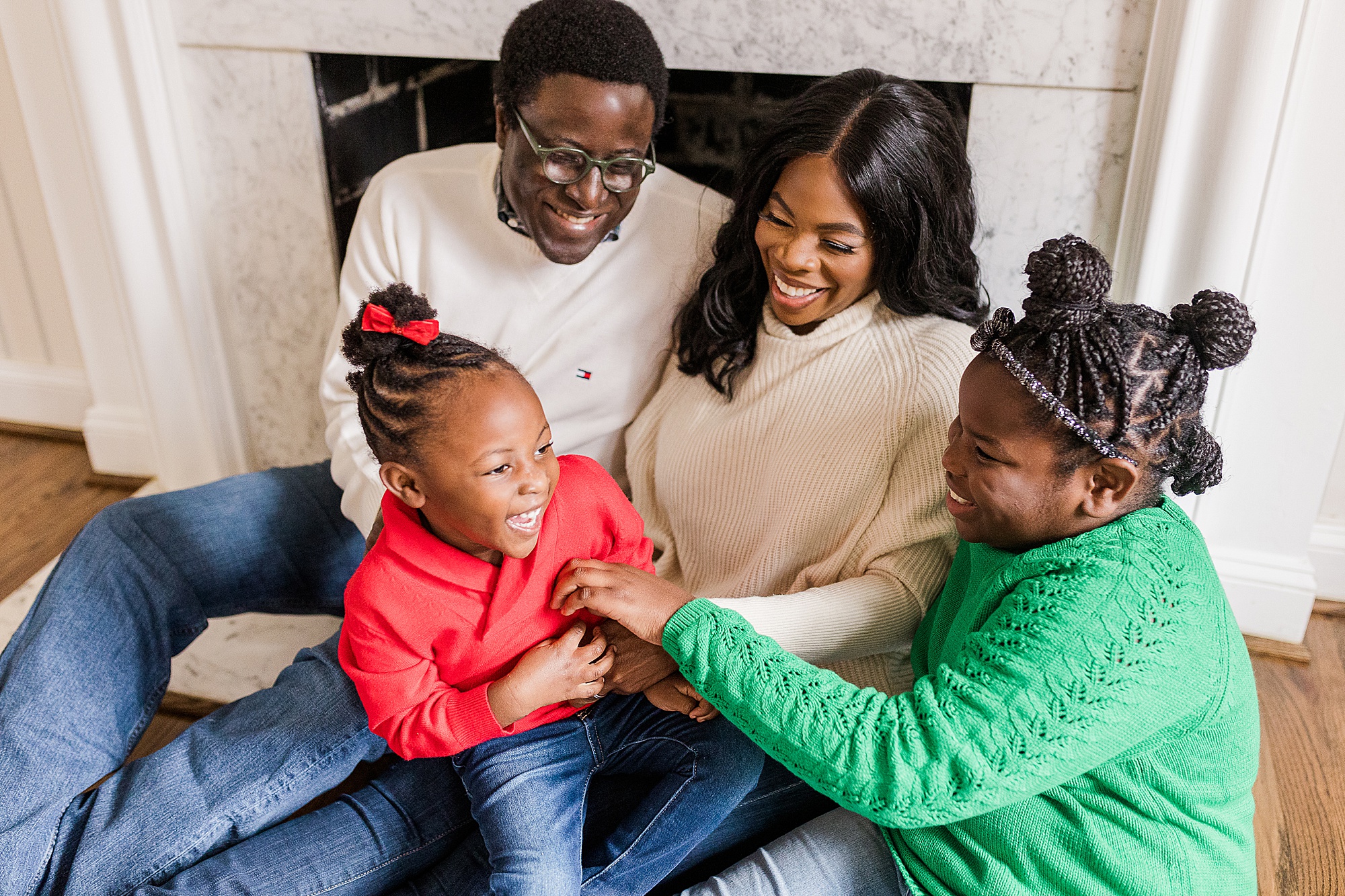 family plays together during Howard County In-Home Holiday Family Session