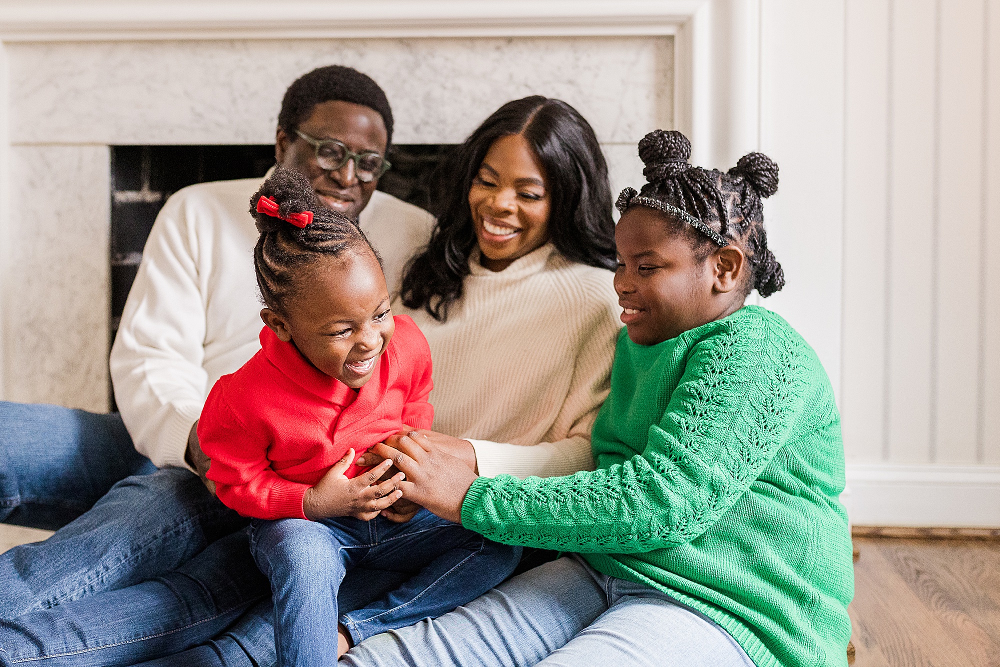 family laughs together during Howard County In-Home Holiday Family Session