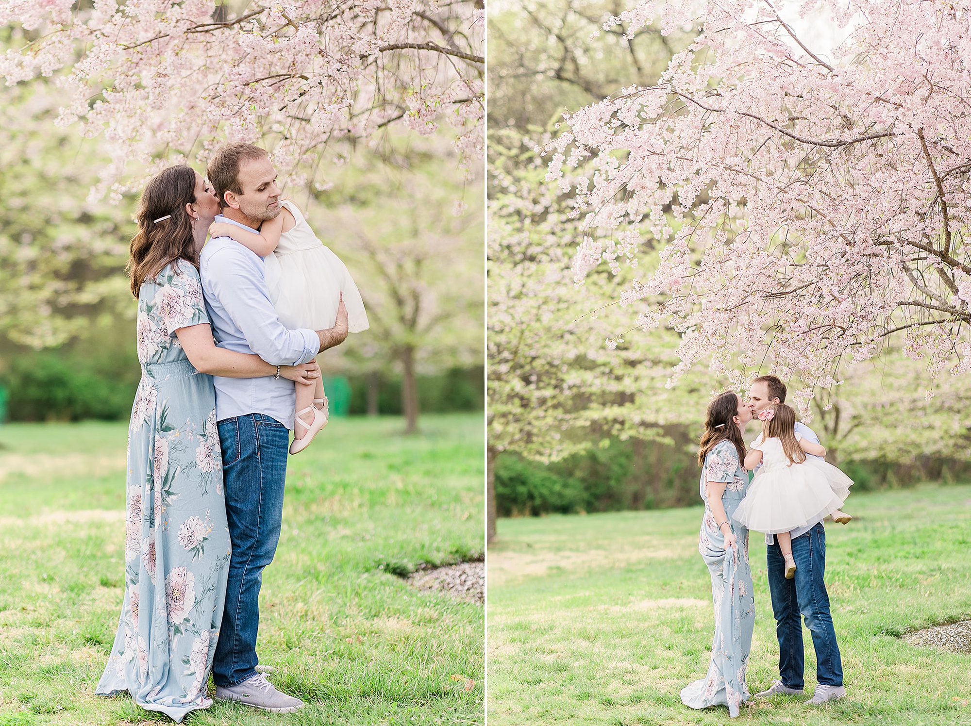 parents hug daughter under cherry blossom tree