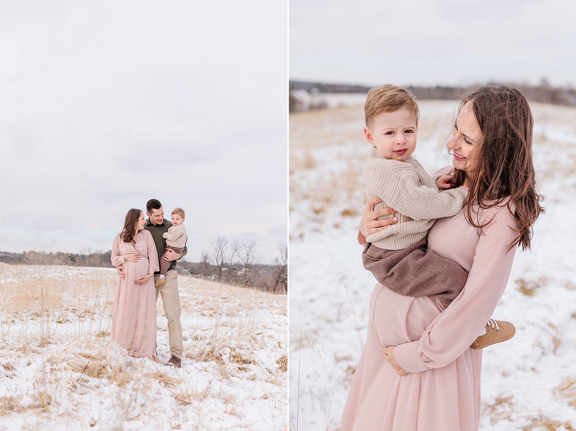 mom in pink gown holds toddler son during snowy maternity session