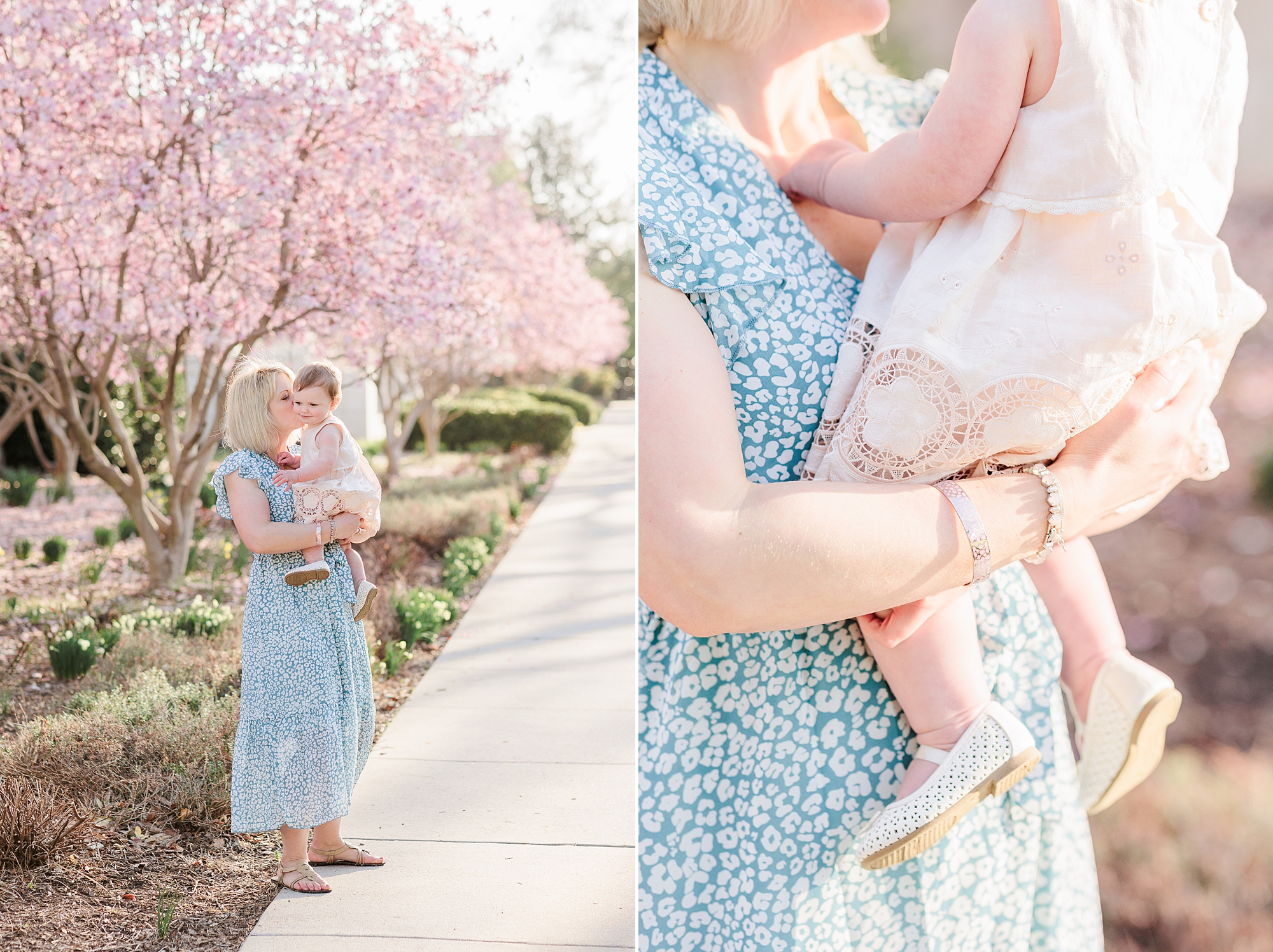 mom holds daughter in pink dress while wearing blue dress