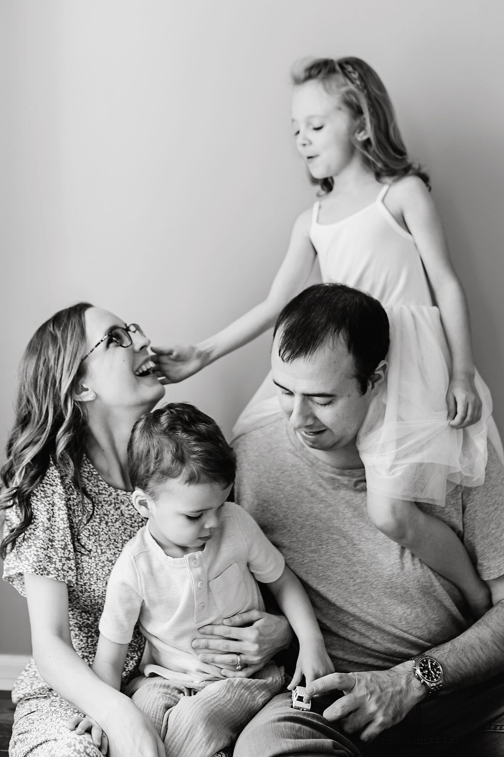 family laughs together during Maryland lifestyle family photos