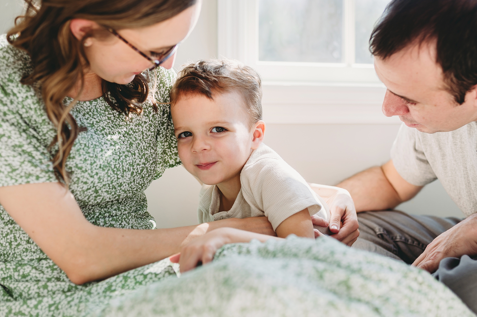 son leans into mom's arm during Maryland lifestyle family photos 