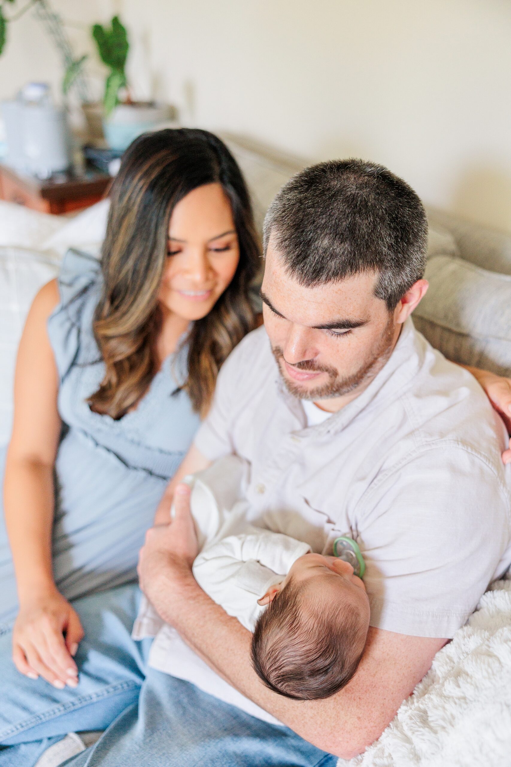 parents look down at son during Northern Virginia newborn session