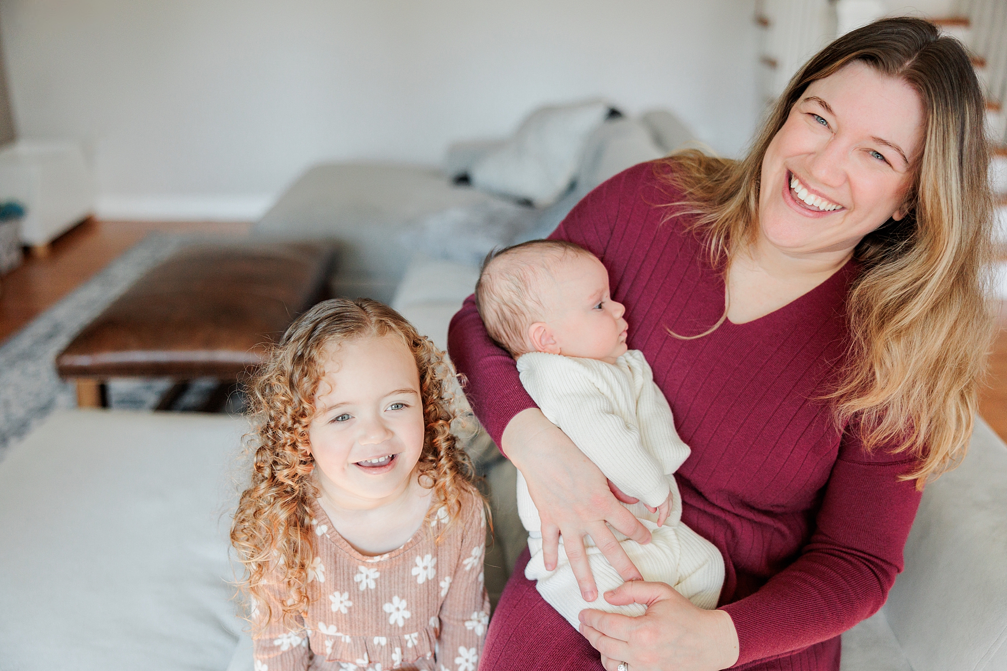 Maryland newborn lifestyle session for mom with baby girl and toddler big sister 