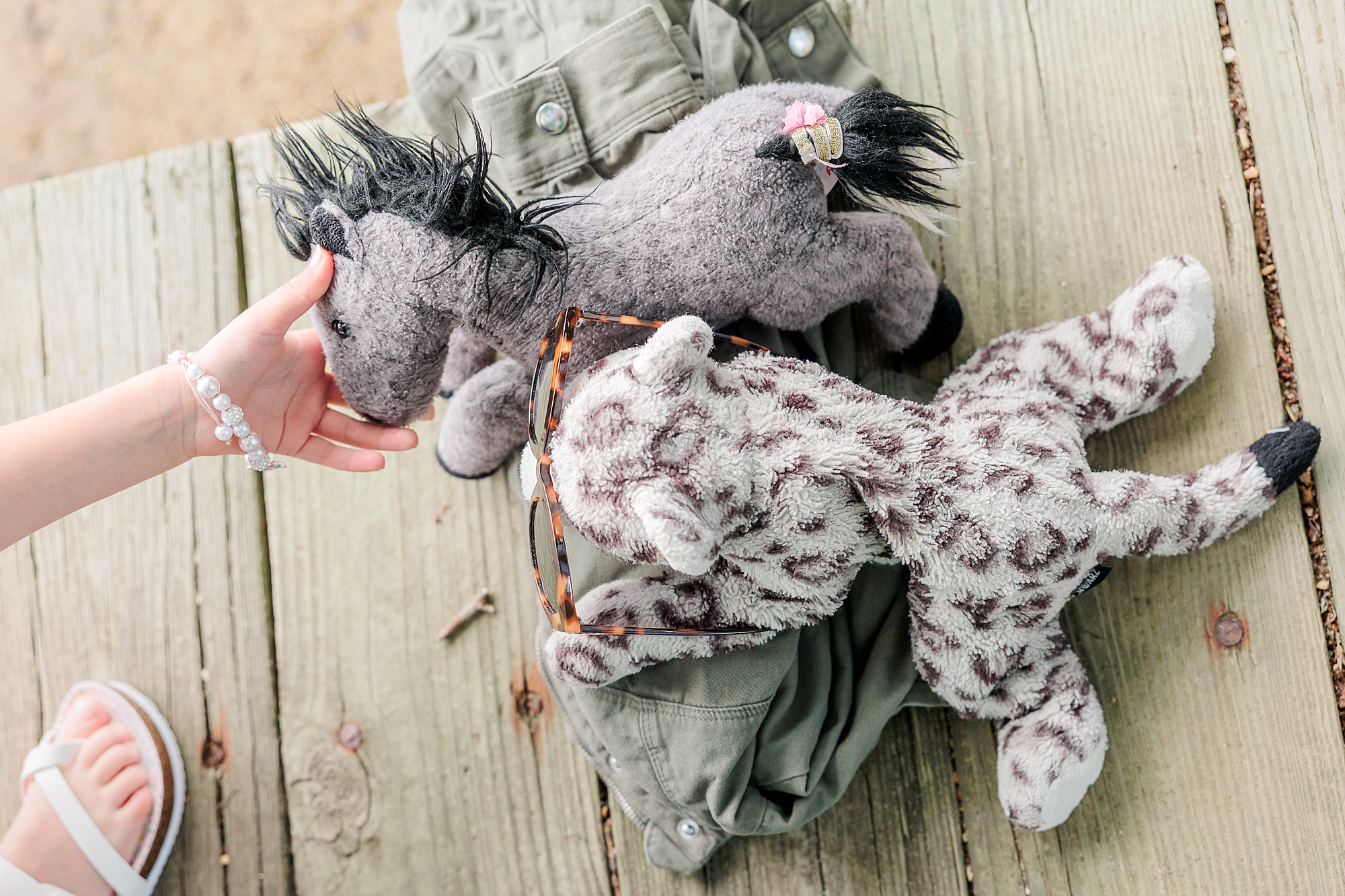 girls play with stuffed animals 